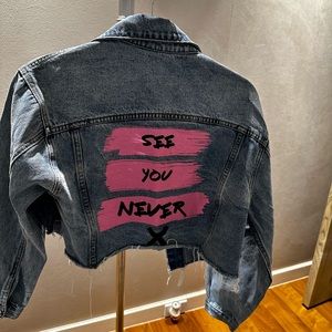 Adika “see you never” cropped jean jacket Sz. S NWOT